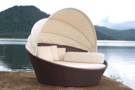 Wicker bed with sun cover