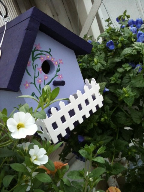 birdhouse and flowers