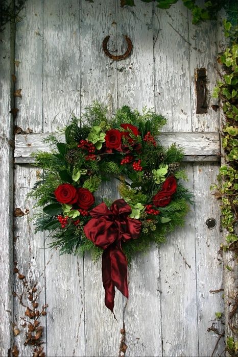 Christmas wreath on a rustic barn door